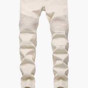 Black champions jacket, red vans, and white rip jeans